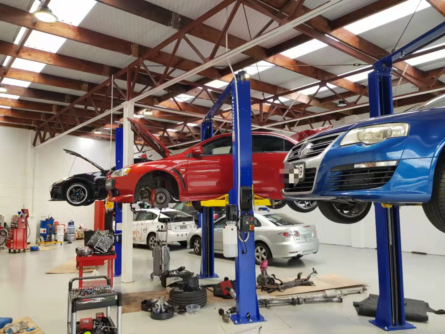 cars on-hoists-resize.jpeg