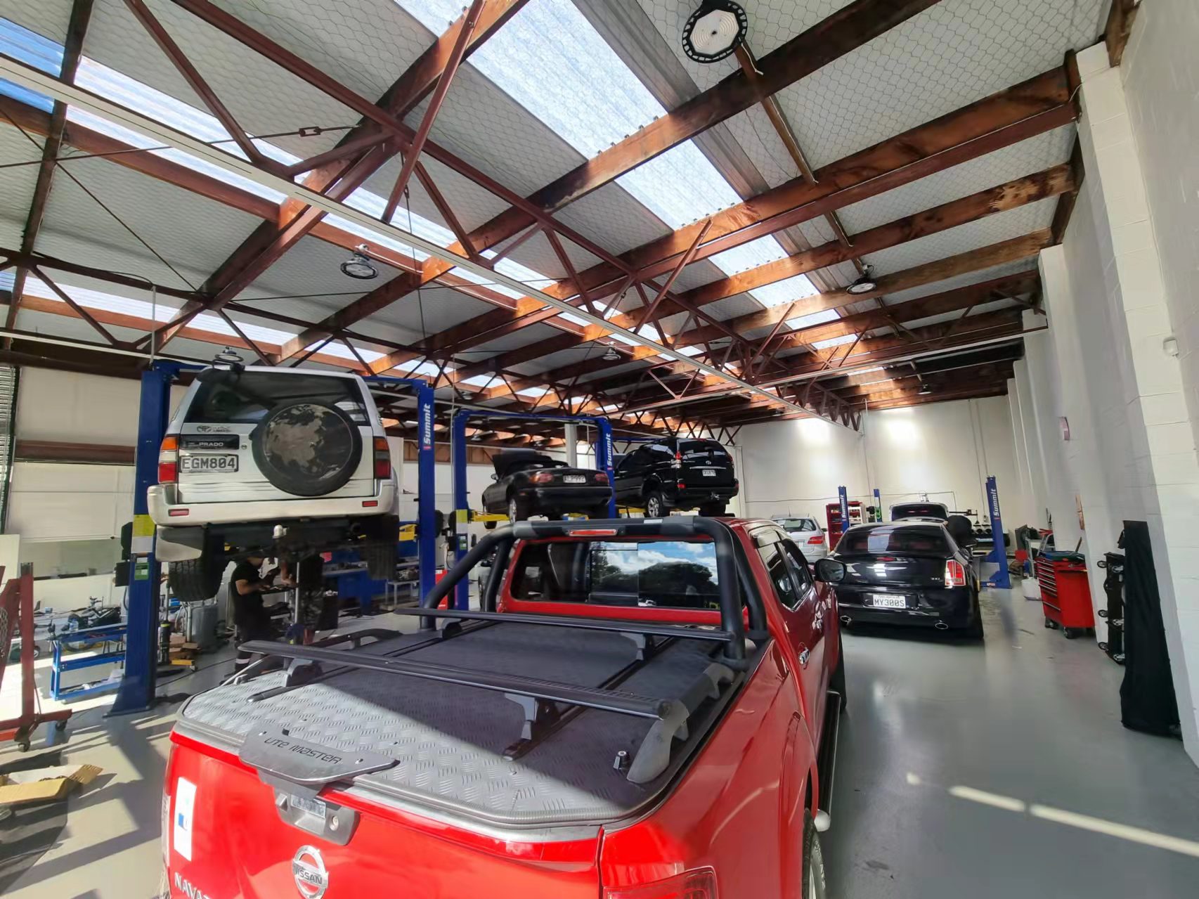 cars on-hoists-resize.jpeg