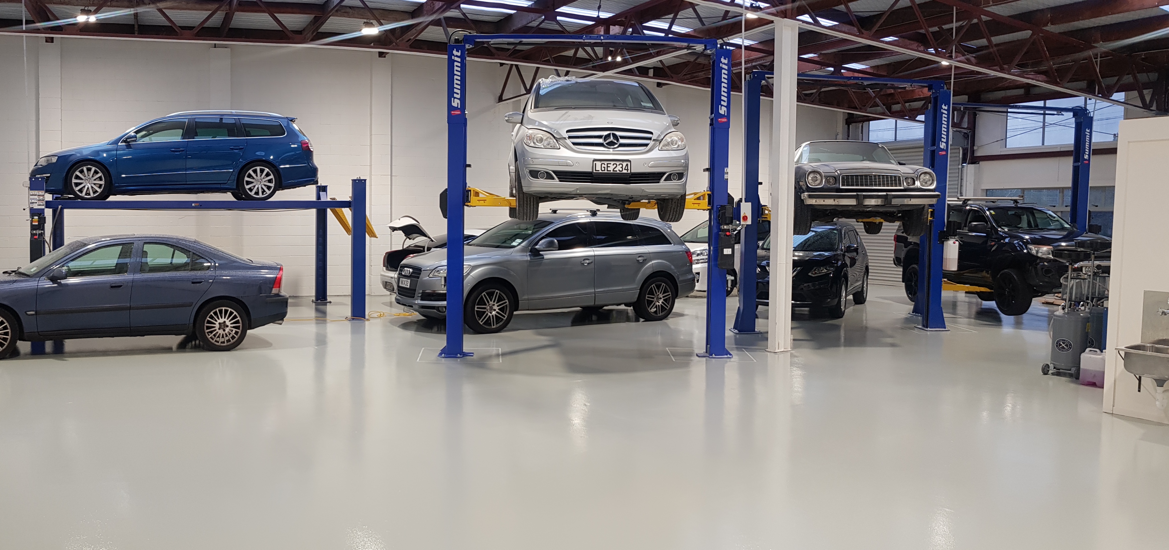 cars on-hoists-resize.jpeg